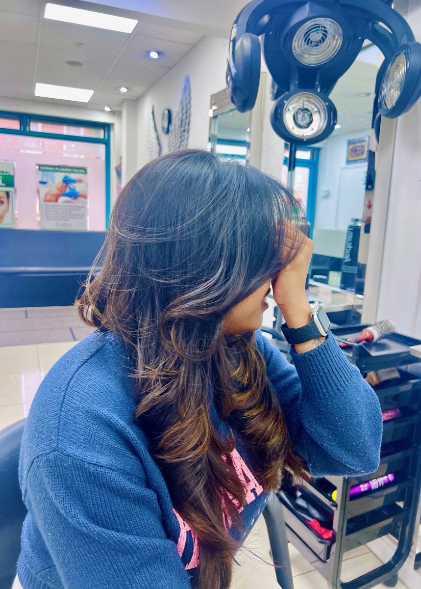 Soft bouncy blow-dry curls styled at the salon
